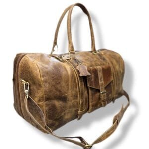 "Brown leather duffle bag with adjustable shoulder strap and multiple pockets, ideal for travel or gym use."