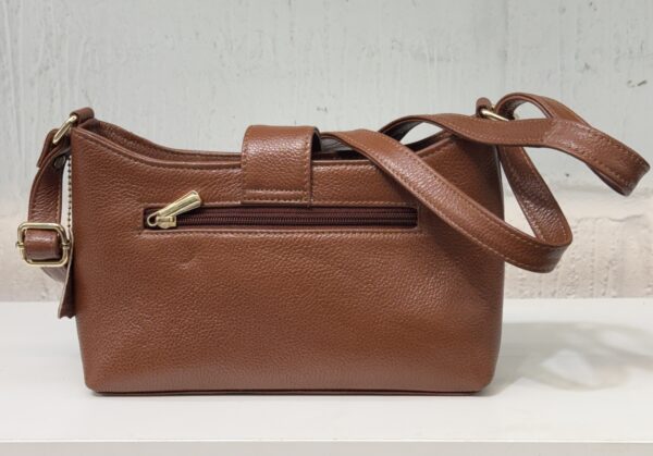 Brown textured leather handbag with a front zip pocket and top strap hardware.